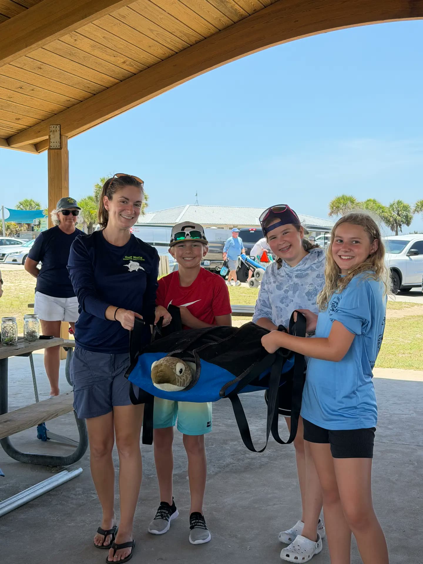 Campers learning about sea turtle rescue with a marine institute educator